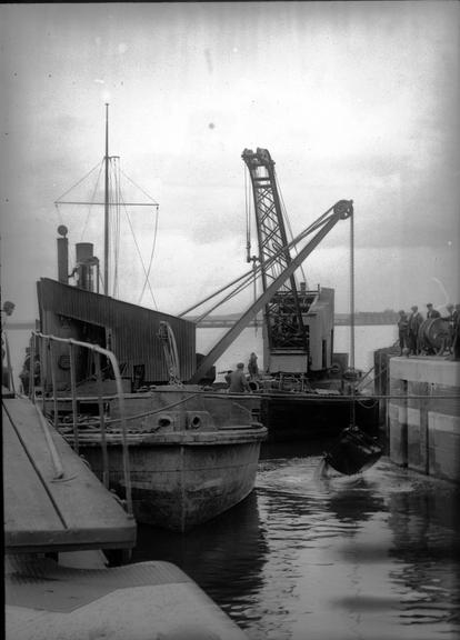 Works photographic negative of dredger and floating crane