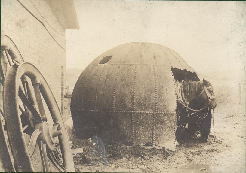 Works photographic negative of horse in old boiler