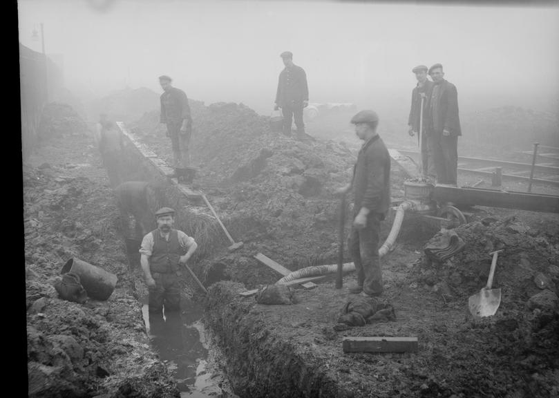 Works photographic negative of flooded trench, Trafford Park