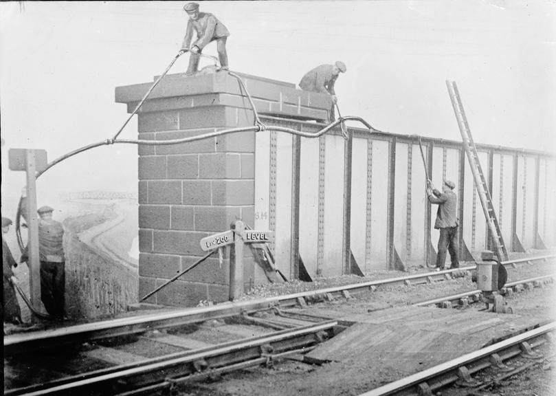 Works photographic negative of cable work on girder bridge