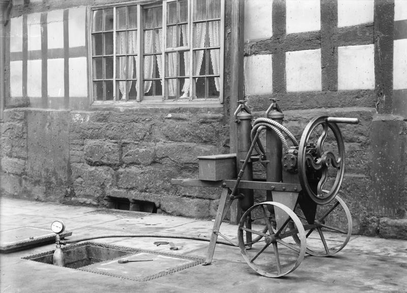 Works photographic negative of view of Dry Core handpump