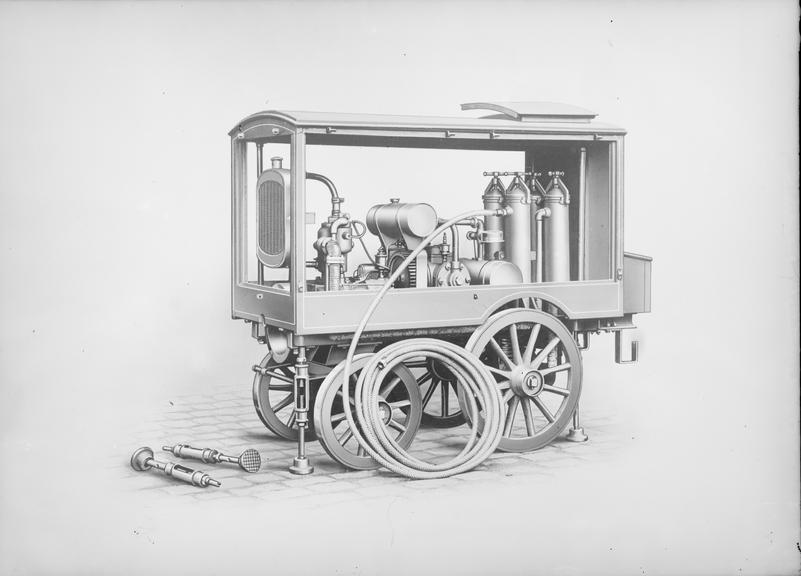 Works photographic negative of 4-wheel trolley with engine