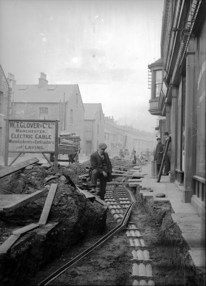 Works photographic negative of small cable in troughing