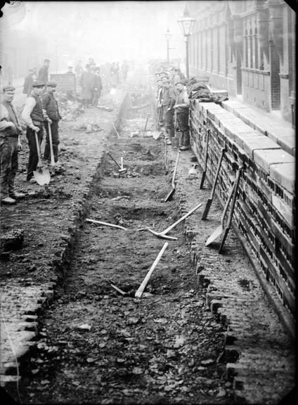 Works photographic negative of trench digging, Salford