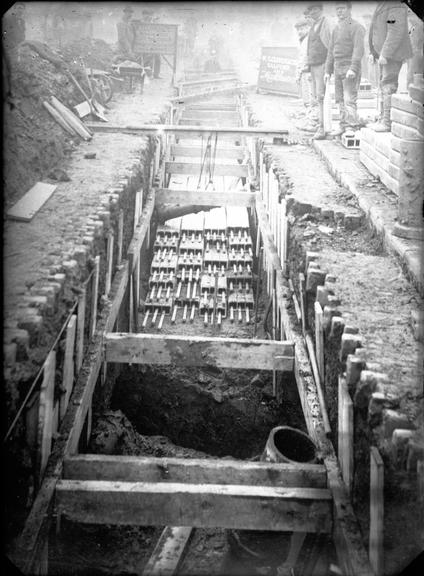 Works photographic negative of buttressed trench, Salford