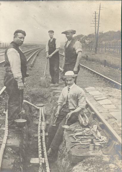 Works photographic negative of cables between railway lines