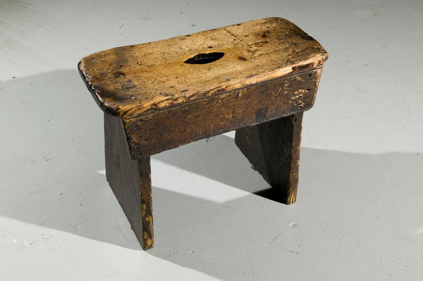 Wooden stool, Photographed on display in the Textiles gallery.