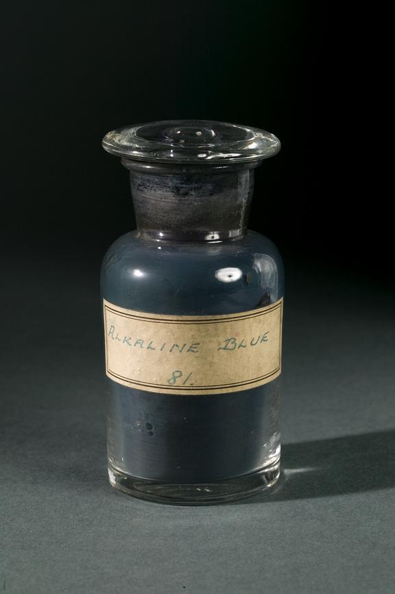 Sample of Alkaline Blue dye.
Photographed on a grey background.