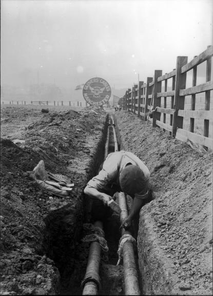 Works photographic negative of steel tubes being jointed