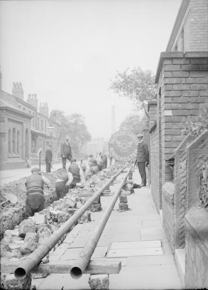 Works photographic negative of lengths of steel tubes