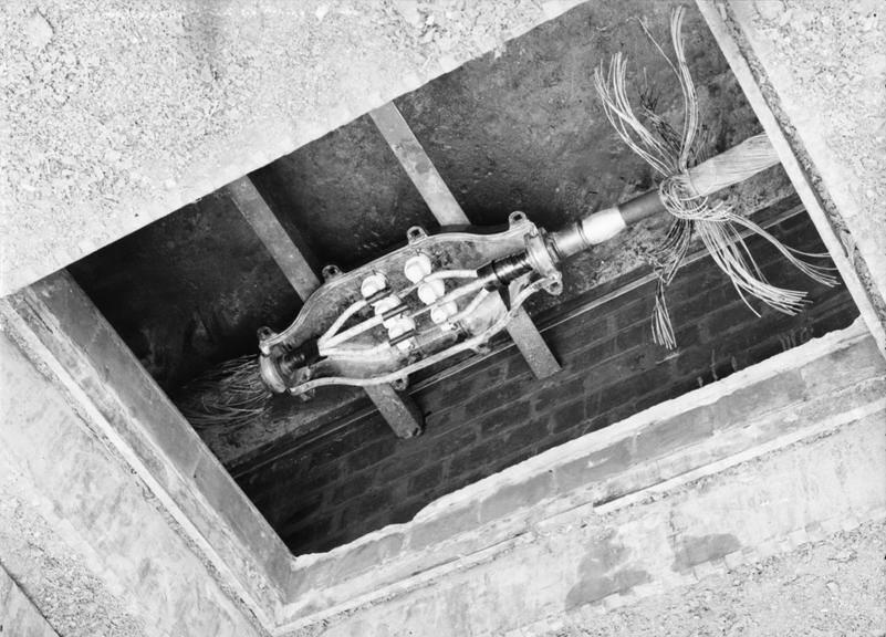 Works photographic negative of cables in manhole, Pemberton, nr