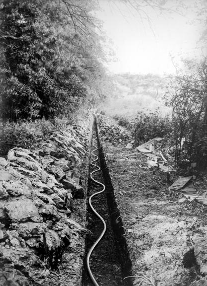 Works photographic negative of trench in countryside, Arksey