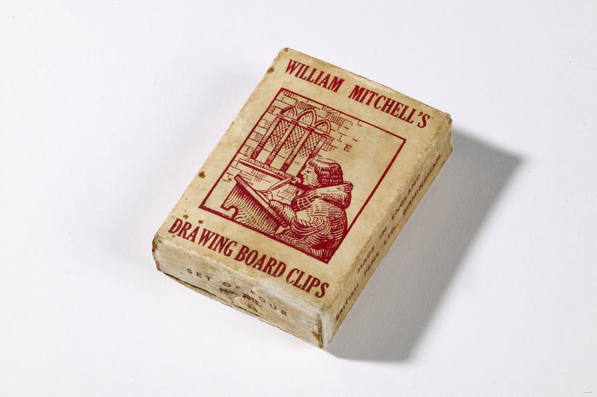 Box of William Mitchell's drawing board clips made by the