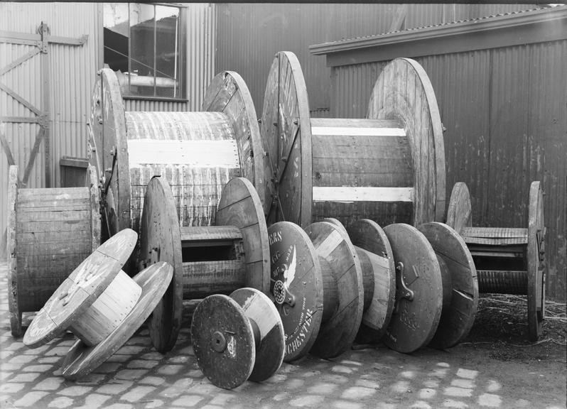 Works photographic negative of drums in yard