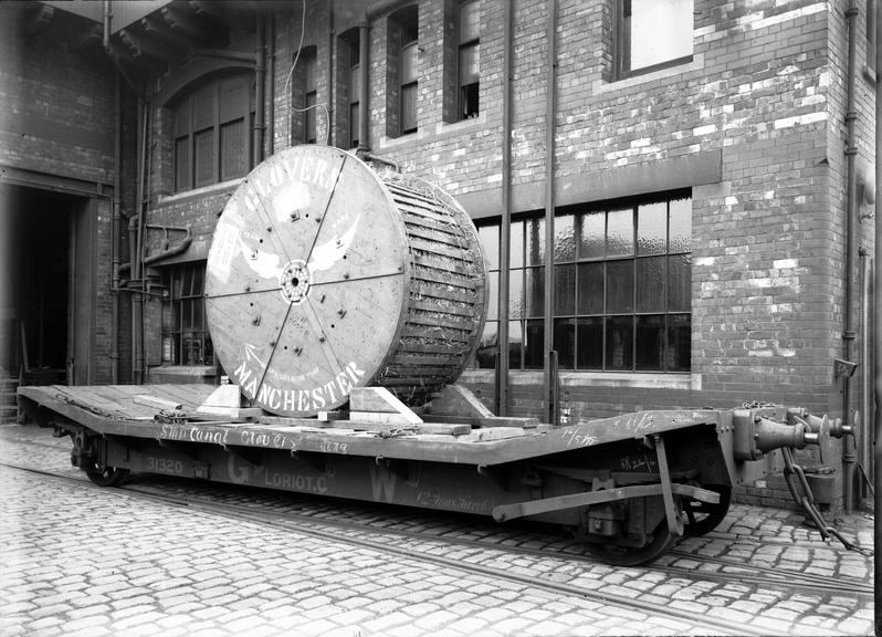 Works photographic negative of cable drum on wagon