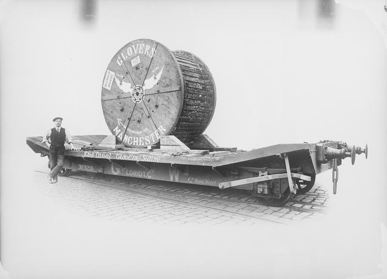 Works photographic negative of drum on wagon, WT Glover & Co