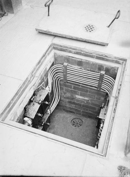 Works photographic negative of cables in manhole, Bacup