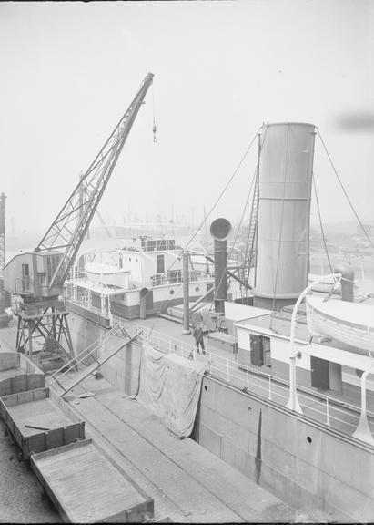 Works photographic negative of a steamship at quayside