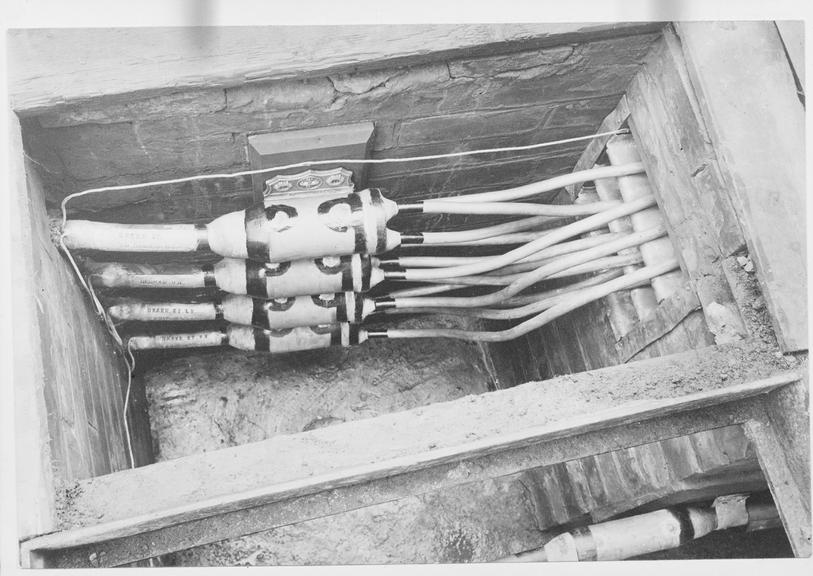 Works photographic negative of cables in manhole, Rochdale