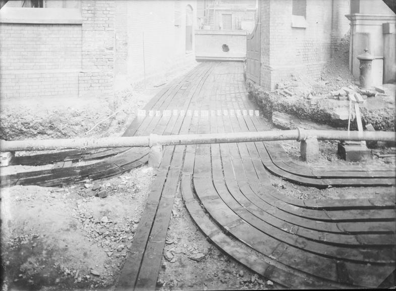 Works photographic negative of trench with troughing