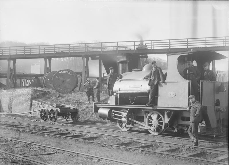 Works photographic negative of engine pulling cable