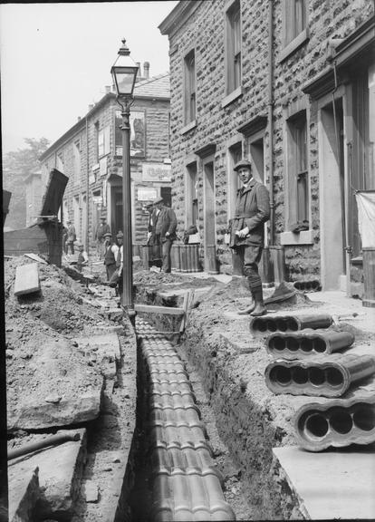 Works photographic negative of trench with conduit, Rawtenstall