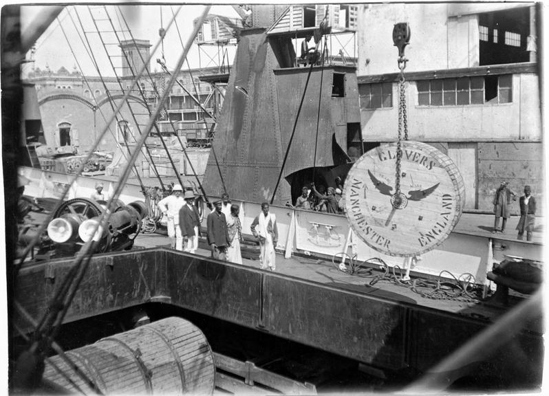 Works photographic negative of cable drum on crane