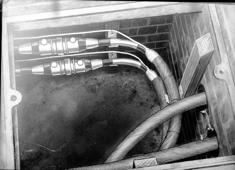 Works photographic negative of jointed cables in manhole, Wigan