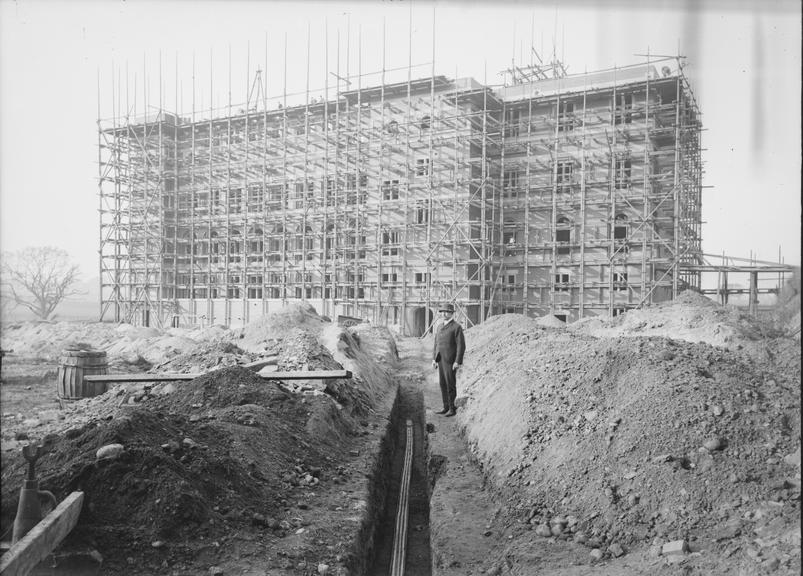 Works photographic negative of cable in trench