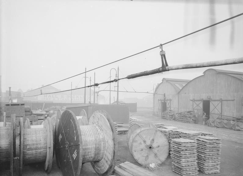 Works photographic negative of cable on wire