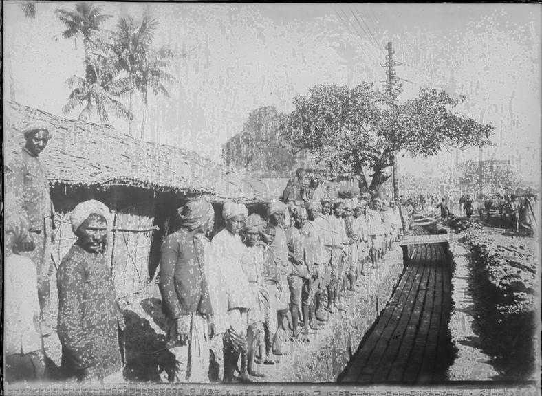 Works photographic negative of men by trench