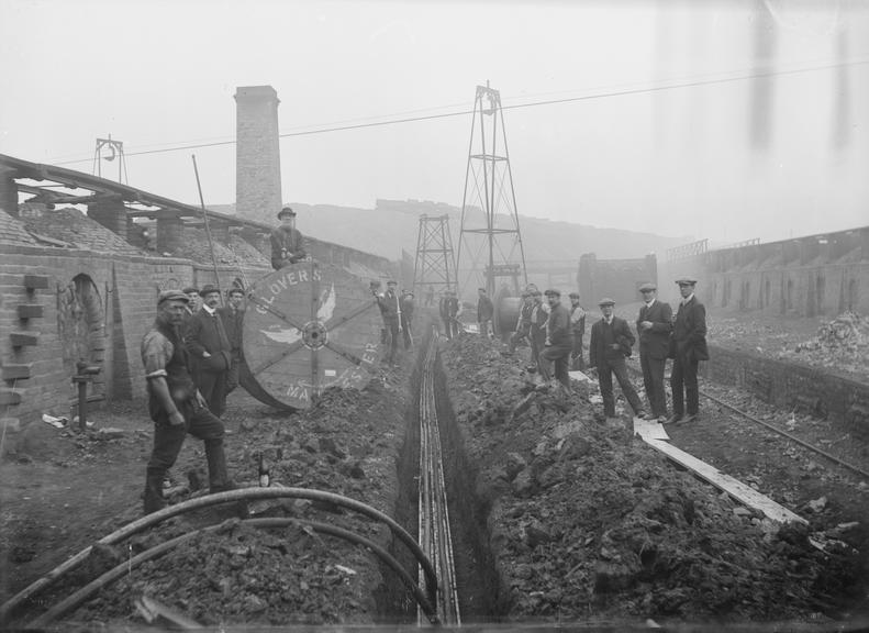 Works photographic negative of cable in troughing