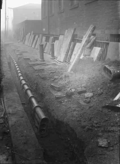 Works photographic negative of conduit laying, Huddersfield