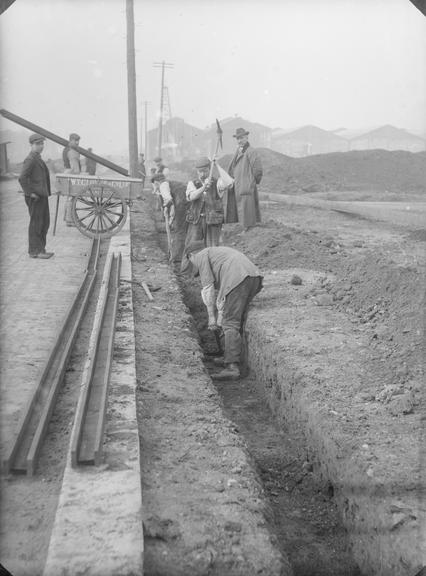 Works photographic negative of men digging trench, Trafford Park