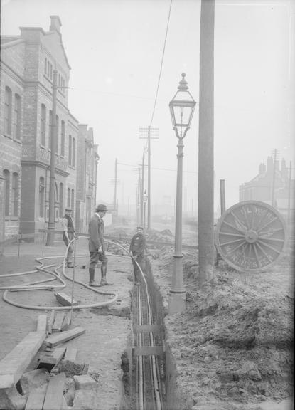 Works photographic negative of cable laying, Trafford Park