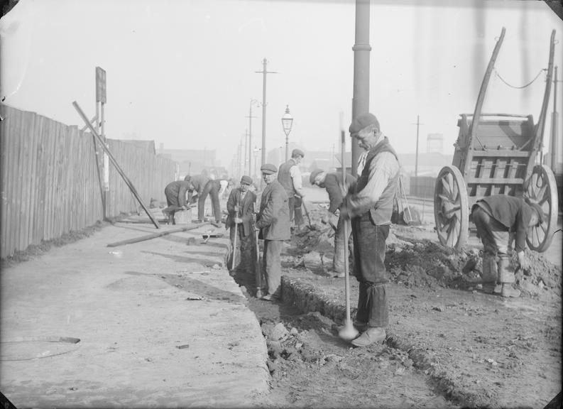 Works photographic negative of trench filling, Trafford Park