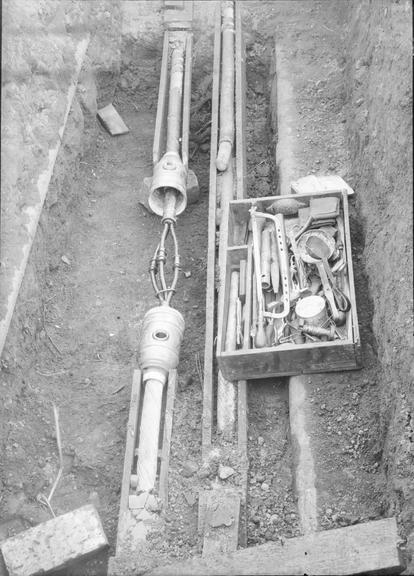 Works photographic negative of cable in troughing, Trafford Park