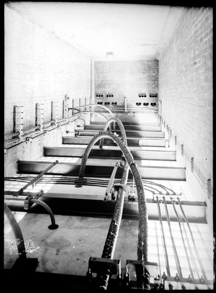 Works photographic negative of cables on tunnel roof