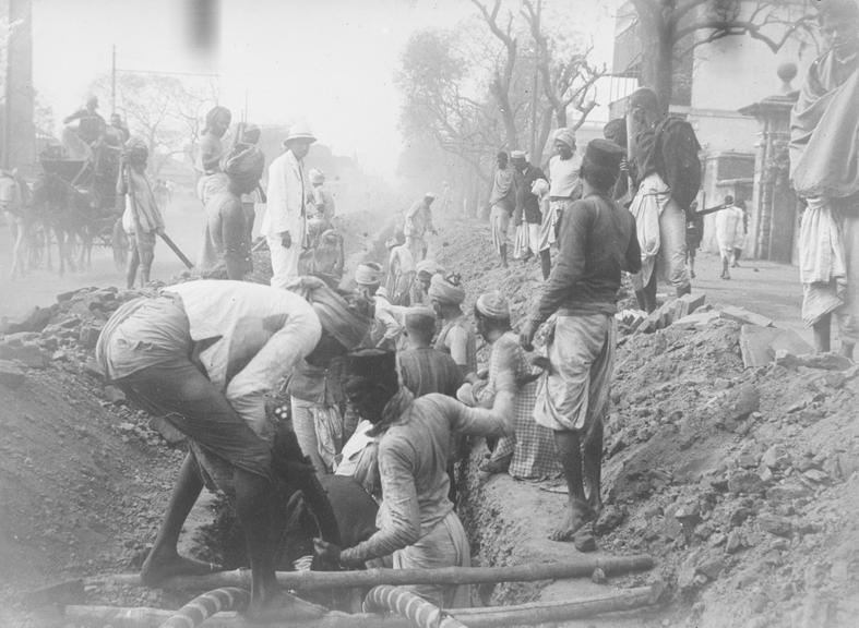 Works photographic negative of men in trench