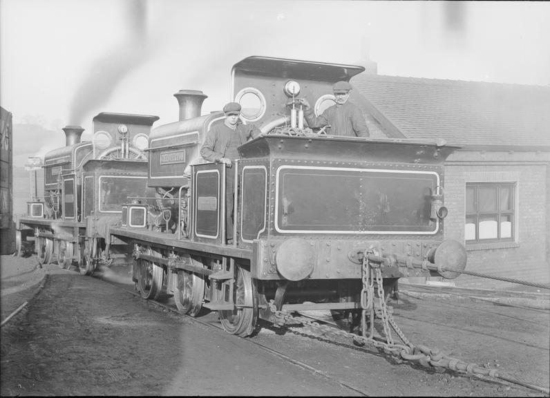 Works photographic negative of cables attached to locomotive