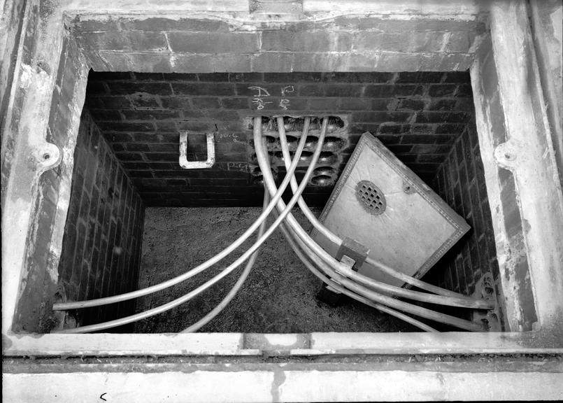 Works photographic negative of view into manhole, Rawtenstall