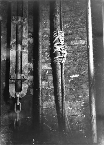 Works photographic negative of cables in pit shaft