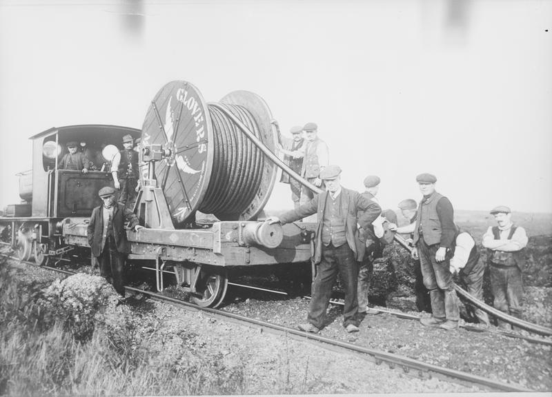 Works photographic negative of cable drum on railway wagon