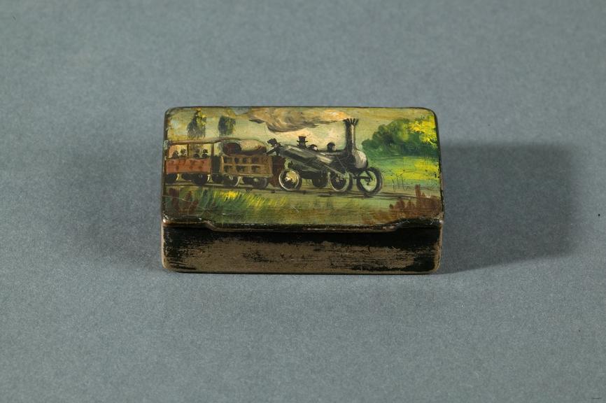 Commemorative snuff box showing the 'Rocket' locomotive