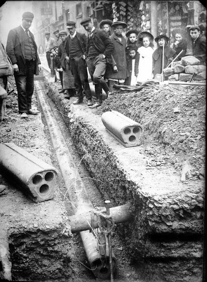 Works photographic negative of conduit in trench, Gosport