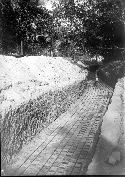 Works photographic negative of trench with cable troughs