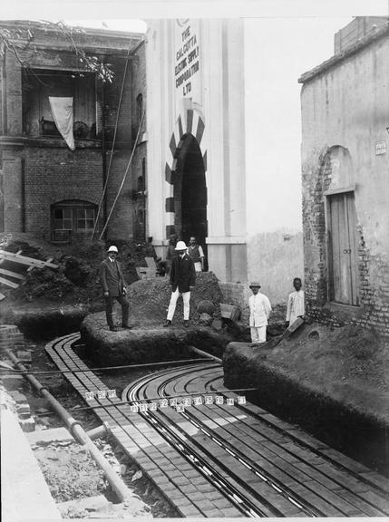 Works photographic negative of cable troughs in street