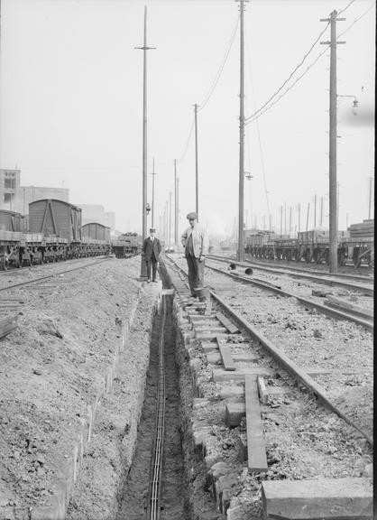 Works photographic negative of cables in troughing