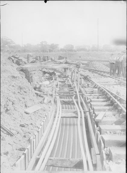 Works photographic negative of troughs in trench