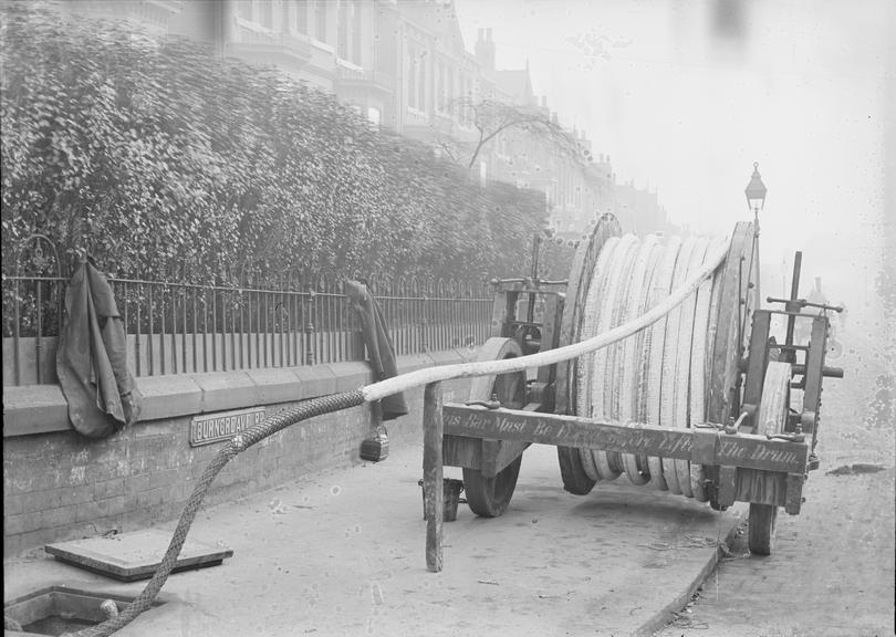 Works photographic negative of cable drum and manhole, Sheffield